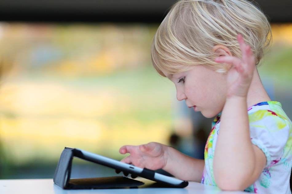 Young Child Learning on Tablet 
